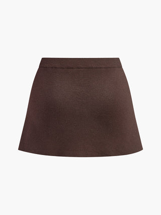Noa | Gonna mini plissettata in maglia con fibbia decorativa