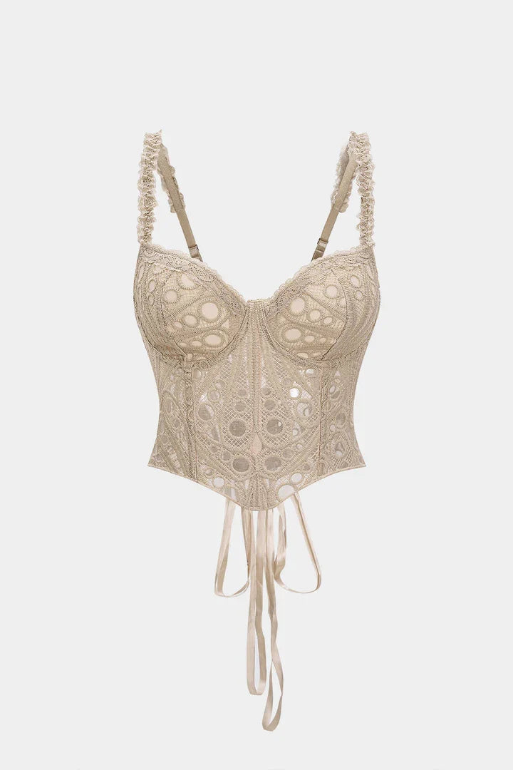 Bustier in pizzo con finitura e fiocco sulla schiena.