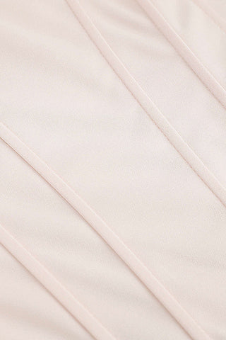 Top con zip e vita a corsetto